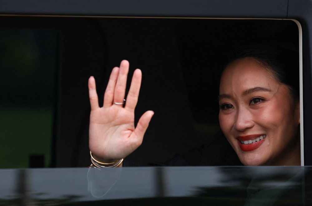 Thailand leadership crisis deepens: 5 candidates, 2 camps, no clear winner Thailand’s dismissed prime minister, Paetongtarn Shinawatra, waves from a vehicle as she leaves the Government House in Bangkok on August 29, 2025, after a Constitutional Court ruling removed her from office. — Reuters pic