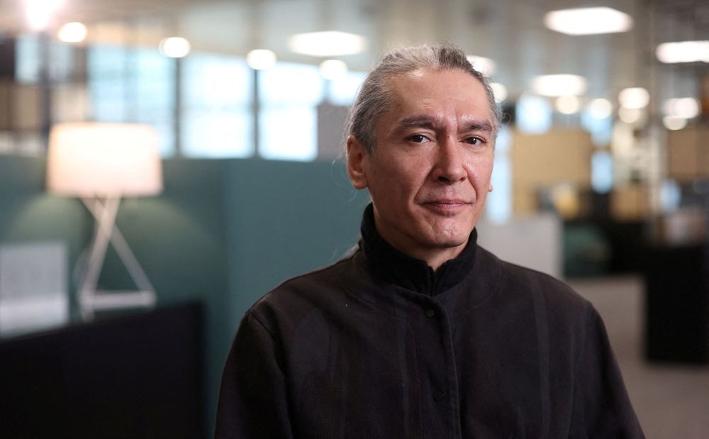 Kim Aris, the son of Aung San Suu Kyi, Myanmar's detained former leader, poses for a portrait at the Reuters office in London April 18, 2024. — Reuters pic Kim Aris, the son of Aung San Suu Kyi, Myanmar's detained former leader, poses for a portrait at the Reuters office in London April 18, 2024. — Reuters pic