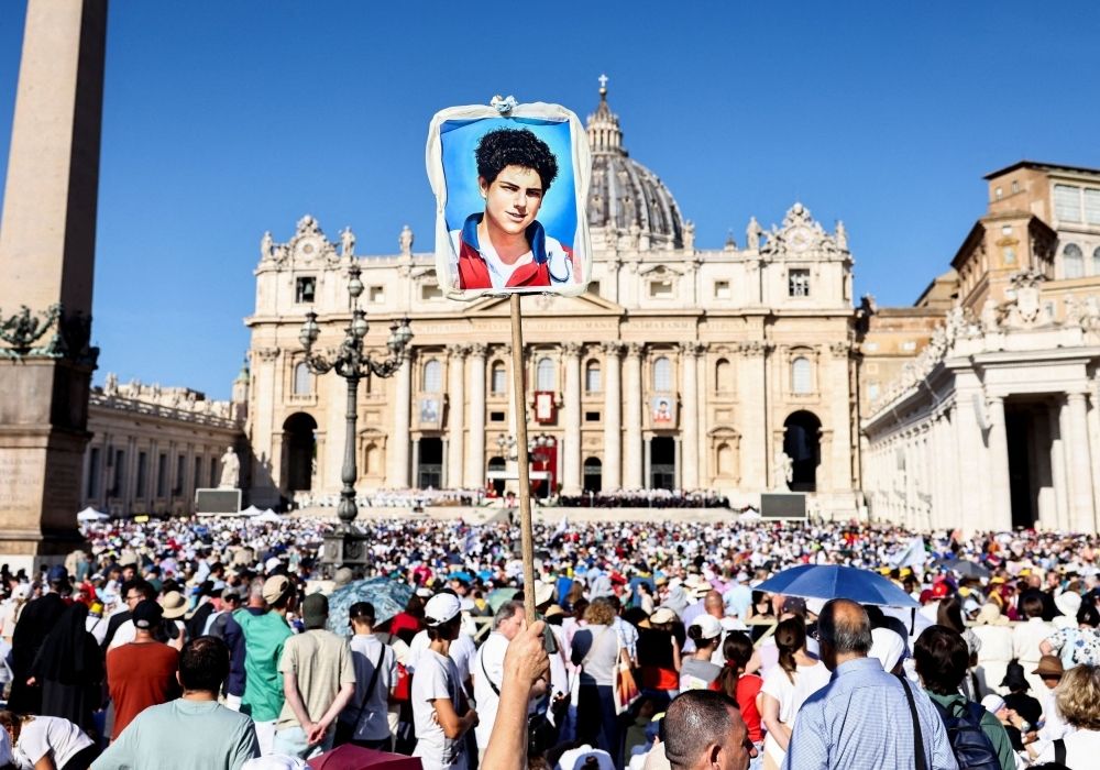 Pope declares ‘God’s influencer’ first millennial saint A person holds up an artwork on the day Pope Leo XIV leads a Holy Mass for the canonisation of Carlo Acutis, a British-born Italian boy who will become the first millennial to be made a Catholic saint, and Pier Giorgio Frassati, in St. Peter's Square at the Vatican, September 7, 2025. — Reuters pic