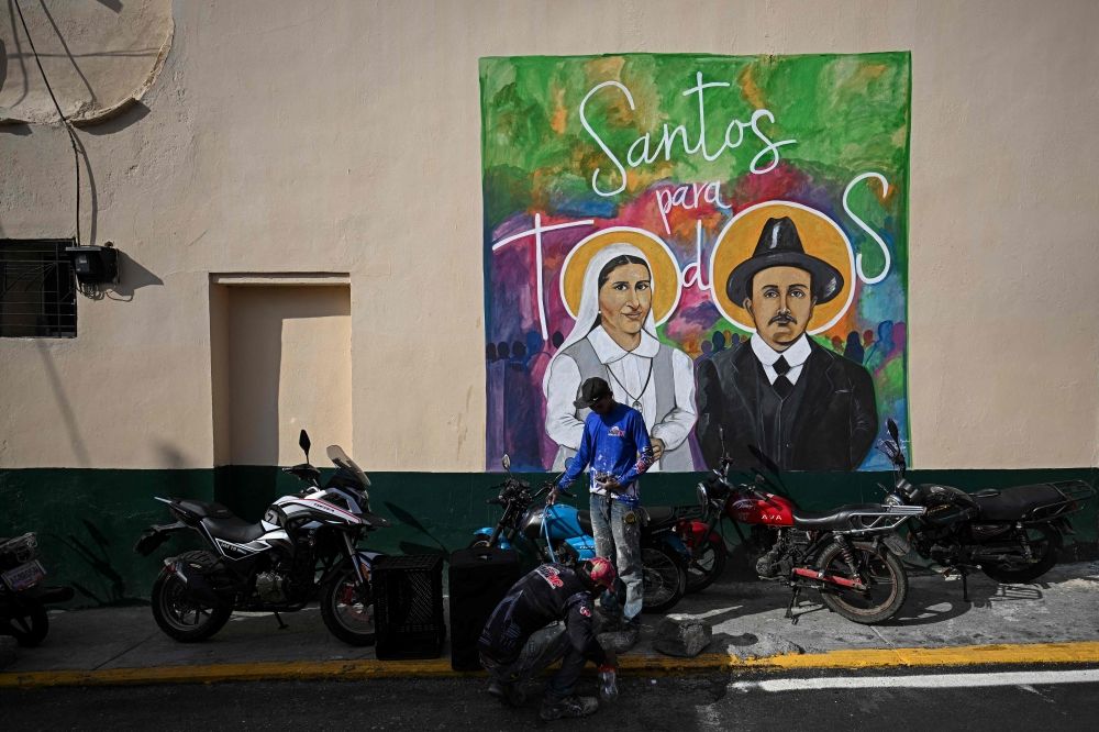A mural in Caracas shows Venezuela's first two saints to be canonised on October 19, 2025 – Sister Maria and Dr Jose Gregorio Hernandez. — AFP pic A mural in Caracas shows Venezuela's first two saints to be canonised on October 19, 2025 – Sister Maria and Dr Jose Gregorio Hernandez. — AFP pic
