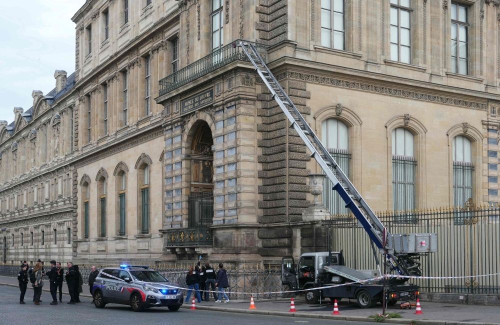 ‘France has been stolen’: French crown jewels snatched in Hollywood-style daytime heist at Paris’ Louvre French police officers stand next to a furniture elevator used by robbers to enter the Louvre Museum, on Quai Francois Mitterrand, in Paris on October 19, 2025. Robbers broke in to the Louvre and fled with jewellery yesterday morning, a source close to the case said, adding that its value was still being evaluated. — AFP pic
