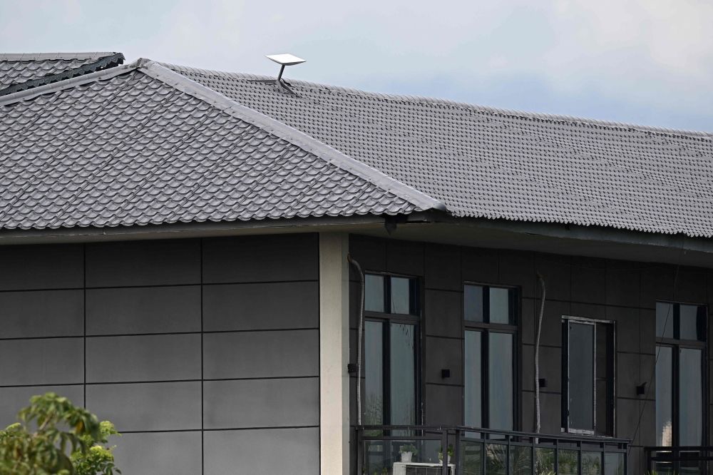 This photo taken on September 17, 2025 shows what appears to be a Starlink satellite dish on the roof of a building at the KK Park complex in Myanmar's eastern Myawaddy township, as pictured from Mae Sot district in Thailand's border province of Tak. — AFP pic This photo taken on September 17, 2025 shows what appears to be a Starlink satellite dish on the roof of a building at the KK Park complex in Myanmar's eastern Myawaddy township, as pictured from Mae Sot district in Thailand's border province of Tak. — AFP pic