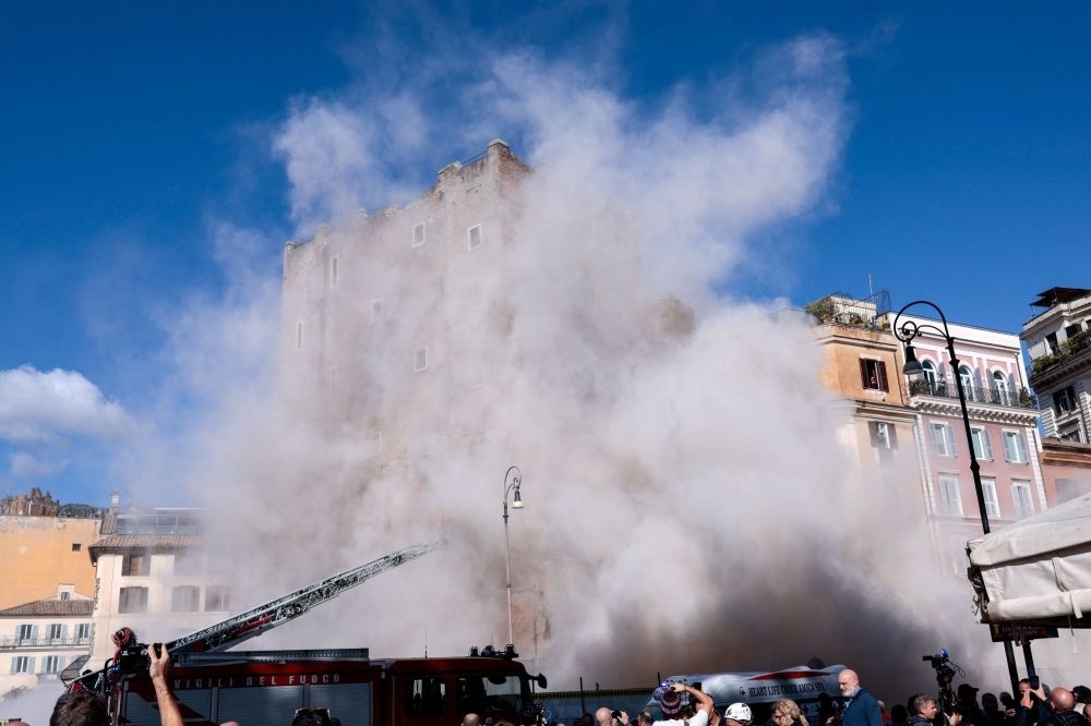 Workers injured in collapse of medieval tower during renovation near Rome’s Colosseum Dust rises as part of the Torre dei Conti tower collapses following an earlier partial collapse, near Via dei Fori Imperiali, near the Colosseum, in Rome November 3, 2025. — Reuters pic