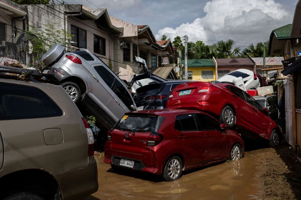 Cars swept away after heavy flooding brought on by Typhoon Kalmaegi are piled up at a subdivision in Bacayan, Cebu City, Philippines, November 5, 2025. — Reuters pic Cars swept away after heavy flooding brought on by Typhoon Kalmaegi are piled up at a subdivision in Bacayan, Cebu City, Philippines, November 5, 2025. — Reuters pic