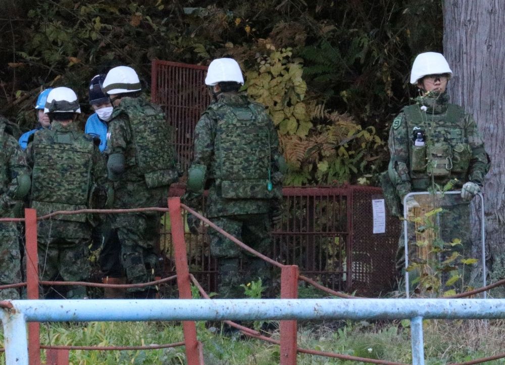 Members of Japan Self-Defense Forces (JSDF) practice setting up a bear trap in Kazuno, Akita Prefecture, Japan, November 5, 2025. — Reuters pic Members of Japan Self-Defense Forces (JSDF) practice setting up a bear trap in Kazuno, Akita Prefecture, Japan, November 5, 2025. — Reuters pic