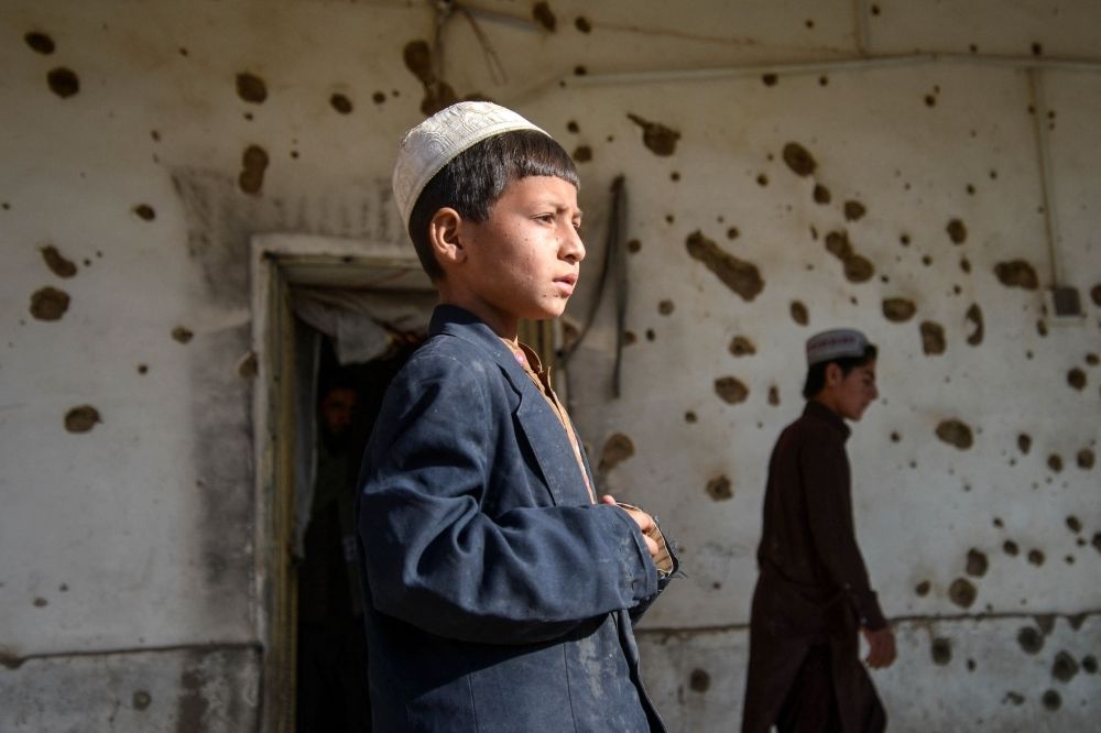 Afghanistan says peace talks with Pakistan fail again, blames ‘uncooperative’ approach Afghan boys walk past a damaged house, following cross-border fire from Pakistan's artillery shelling, at a village in the Spin Boldak district of Kandahar November 7, 2025. — AFP pic