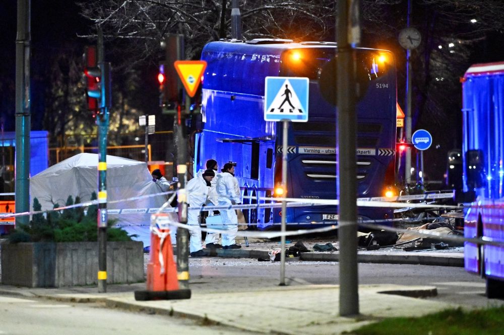 Police technicians work on the site where a bus hit into a bus shelter in Ostermalm in Stockholm, Sweden, November 14, 2025. — TT News Agency/Claudio Bresciani pic via Reuters Police technicians work on the site where a bus hit into a bus shelter in Ostermalm in Stockholm, Sweden, November 14, 2025. — TT News Agency/Claudio Bresciani pic via Reuters