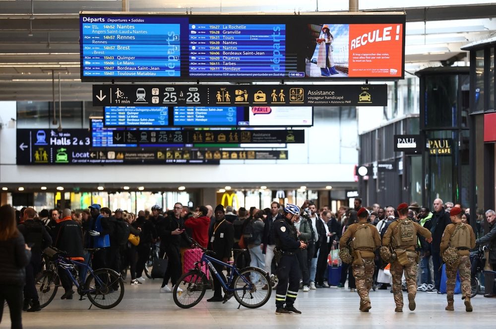French police and soldiers secure the area at the Gare Montparnasse train station during its evacuation in Paris November 14, 2025. — Reuters pic French police and soldiers secure the area at the Gare Montparnasse train station during its evacuation in Paris November 14, 2025. — Reuters pic