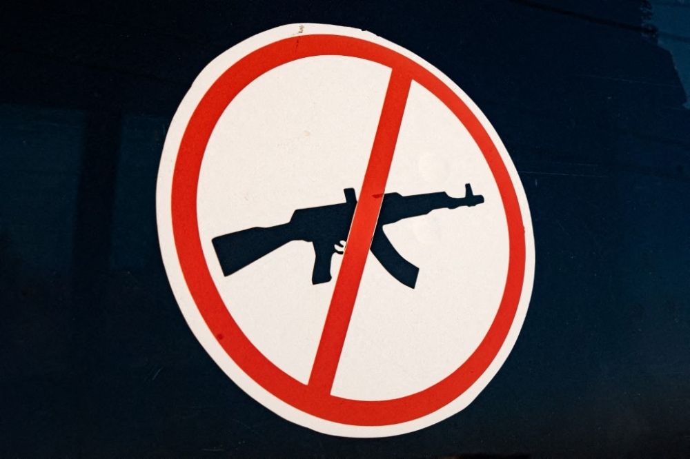 A ‘no weapons’ sticker is displayed on the window of a van at the 70 Kare IDP centre in Mekele, Ethiopia on April 9, 2025. — AFP pic A ‘no weapons’ sticker is displayed on the window of a van at the 70 Kare IDP centre in Mekele, Ethiopia on April 9, 2025. — AFP pic