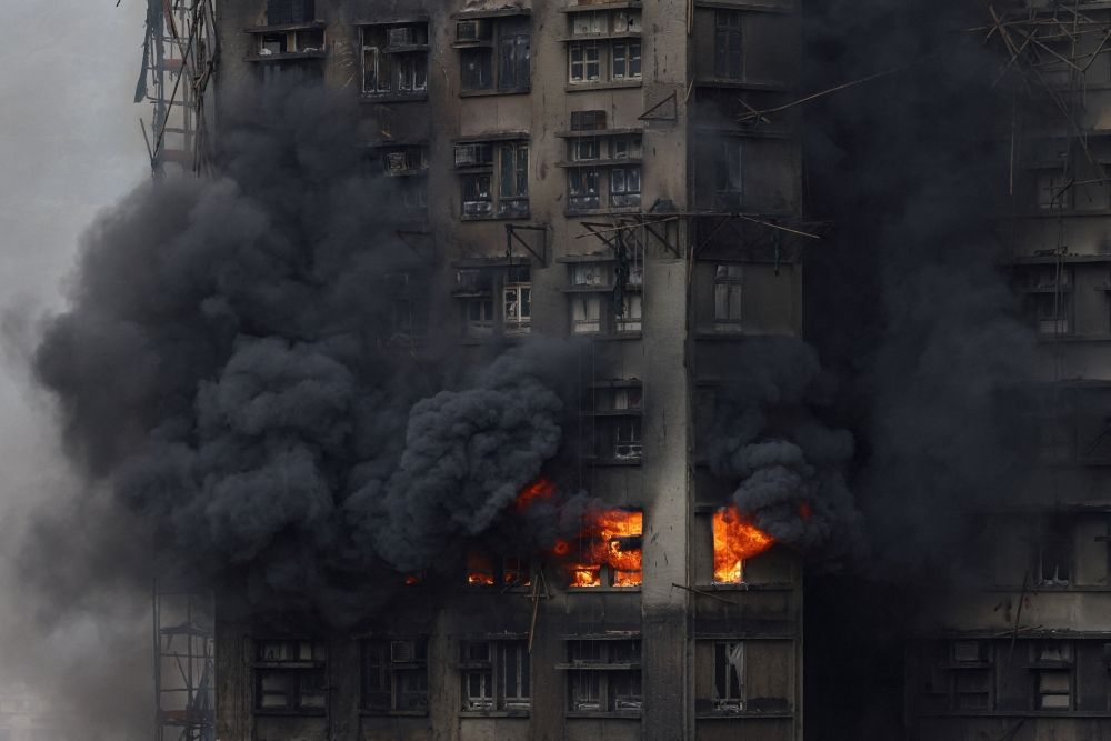 Thick smoke billows from the upper floors of a residential block at Wang Fuk Court housing estate during a major fire that engulfed bamboo scaffolding across multiple buildings, in Tai Po, Hong Kong November 27, 2025. — Reuters pic Thick smoke billows from the upper floors of a residential block at Wang Fuk Court housing estate during a major fire that engulfed bamboo scaffolding across multiple buildings, in Tai Po, Hong Kong November 27, 2025. — Reuters pic