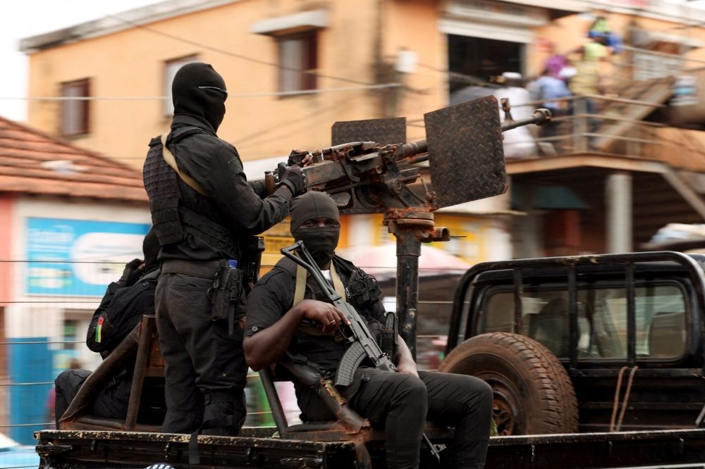 Guinea-Bissau coup d’etat explained: Drug lords, election fraud claims, and what comes next Soldiers patrol on the main road in Bissau, Guinea-Bissau, on November 21, 2025. — Reuters pic