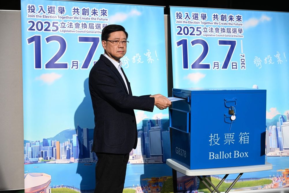 Hong Kong Chief Executive John Lee casts his vote in the Legislative Council elections in Hong Kong on December 7, 2025. — AFP pic Hong Kong Chief Executive John Lee casts his vote in the Legislative Council elections in Hong Kong on December 7, 2025. — AFP pic