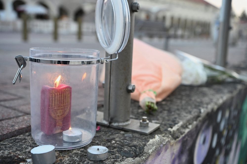 Candles burn following the attack on a Jewish holiday celebration at Sydney's Bondi Beach, in Sydney December 15, 2025. — Reuters pic Candles burn following the attack on a Jewish holiday celebration at Sydney's Bondi Beach, in Sydney December 15, 2025. — Reuters pic