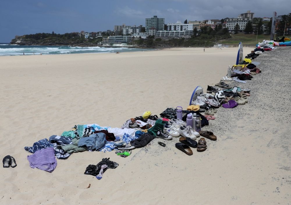 Belongings left behind by people are gathered at the beach near the scene of a shooting on a Jewish holiday celebration at Bondi Beach, in Sydney December 15, 2025. — Reuters pic Belongings left behind by people are gathered at the beach near the scene of a shooting on a Jewish holiday celebration at Bondi Beach, in Sydney December 15, 2025. — Reuters pic