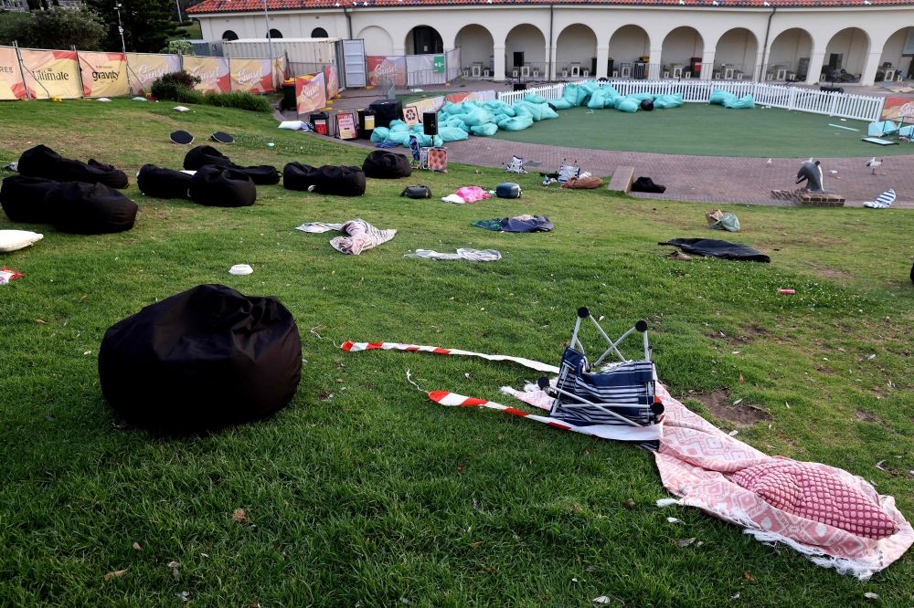 Belongings of members of the Jewish community are seen at the scene of a shooting at Bondi Beach in Sydney on December 15, 2025 that Australian police said was carried out by a father-and-son that left 16 people dead. — AFP pic Belongings of members of the Jewish community are seen at the scene of a shooting at Bondi Beach in Sydney on December 15, 2025 that Australian police said was carried out by a father-and-son that left 16 people dead. — AFP pic