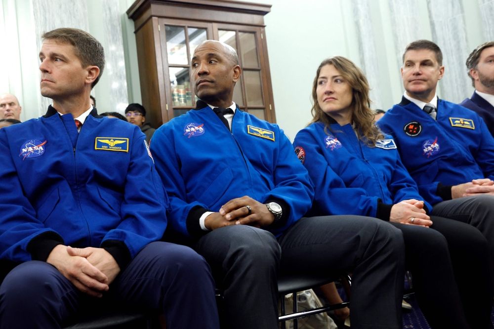Artemis II astronauts (left to right) Commander Reid Wiseman, Pilot Victor Glover and Mission Specialists Christina Koch and Jeremy Hansen look on as Jared Isaacman, U.S. President Donald Trump's nominee to be National Aeronautics and Space Administration (NASA) Administrator, testifies during a Senate Commerce, Science, and Transportation Committee confirmation hearing in the Russell Senate Office Building on Capitol Hill on April 09, 2025 in Washington, DC. — AFP pic Artemis II astronauts (left to right) Commander Reid Wiseman, Pilot Victor Glover and Mission Specialists Christina Koch and Jeremy Hansen look on as Jared Isaacman, U.S. President Donald Trump's nominee to be National Aeronautics and Space Administration (NASA) Administrator, testifies during a Senate Commerce, Science, and Transportation Committee confirmation hearing in the Russell Senate Office Building on Capitol Hill on April 09, 2025 in Washington, DC. — AFP pic