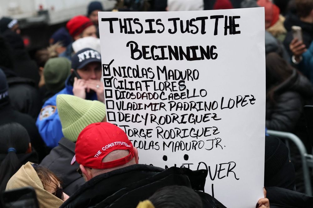 People gather outside the Daniel Patrick Moynihan United States Courthouse before the arraignment of Venezuelan President Nicolas Maduro and first lady Cilia Flores in New York City on January 5, 2026. — AFP pic People gather outside the Daniel Patrick Moynihan United States Courthouse before the arraignment of Venezuelan President Nicolas Maduro and first lady Cilia Flores in New York City on January 5, 2026. — AFP pic