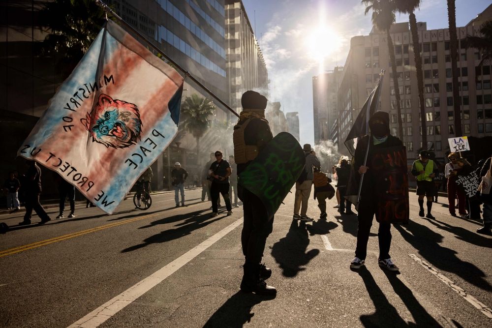 People hold flags as they protest in Los Angeles, California on January 10, 2026 against US Immigration and Customs Enforcement (ICE) after the fatal shooting of Renee Nicole Good in Minneapolis. — AFP pic People hold flags as they protest in Los Angeles, California on January 10, 2026 against US Immigration and Customs Enforcement (ICE) after the fatal shooting of Renee Nicole Good in Minneapolis. — AFP pic