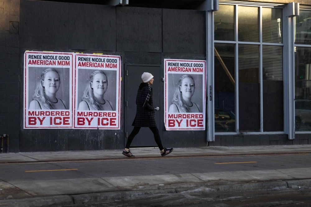 US state sues Trump administration over fatal ICE shooting, slams raids as ‘federal invasion’ A pedestrian walks past poster of Renee Good January 12, 2026 in Minneapolis, Minnesota. — AFP pic