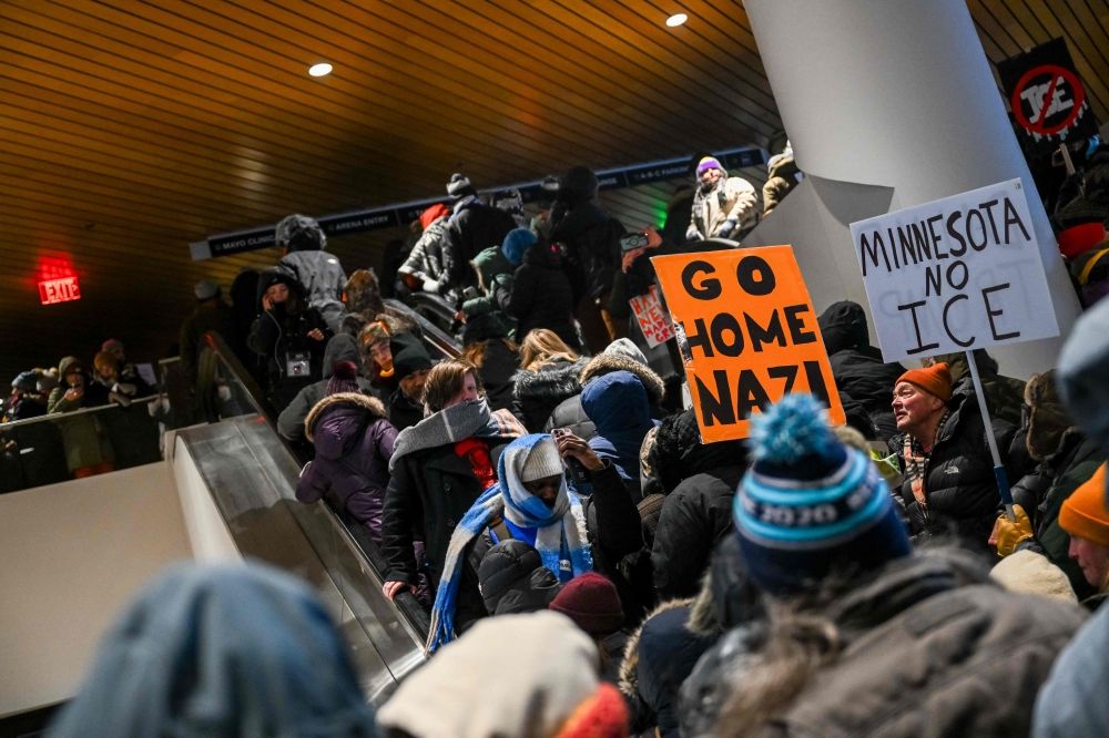Demonstrators participate in a rally and march during an ‘ICE Out’ day of protest in Minneapolis, Minnesota. — AFP pic Demonstrators participate in a rally and march during an ‘ICE Out’ day of protest in Minneapolis, Minnesota. — AFP pic