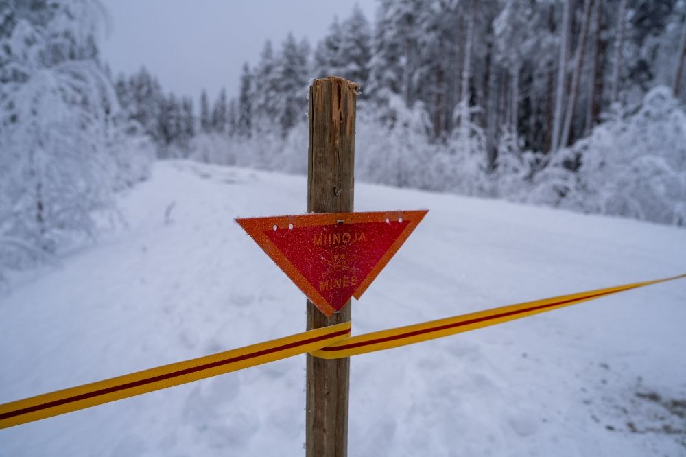 A snow covered road is closed off with a sign showing a skull and crossbones in a red triangle pointing downwards, the international symbol for a mined area during a media day event at the Kainuu Brigade, a Finnish Army unit in Kajaani, Finland, on February 3, 2026. — AFP pic A snow covered road is closed off with a sign showing a skull and crossbones in a red triangle pointing downwards, the international symbol for a mined area during a media day event at the Kainuu Brigade, a Finnish Army unit in Kajaani, Finland, on February 3, 2026. — AFP pic