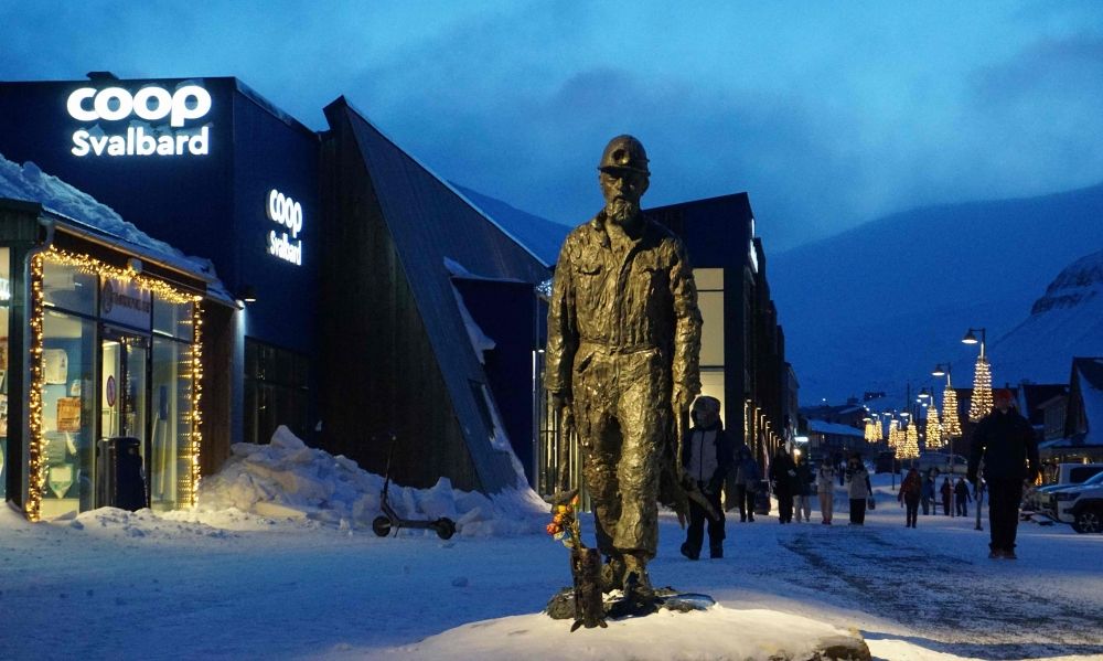 A statue pays tribute to the town's mining past in front of the archipelago's only supermarket in Longyearbyen on the Norwegian archipelago of Svalbard on February 17, 2026. — AFP pic A statue pays tribute to the town's mining past in front of the archipelago's only supermarket in Longyearbyen on the Norwegian archipelago of Svalbard on February 17, 2026. — AFP pic