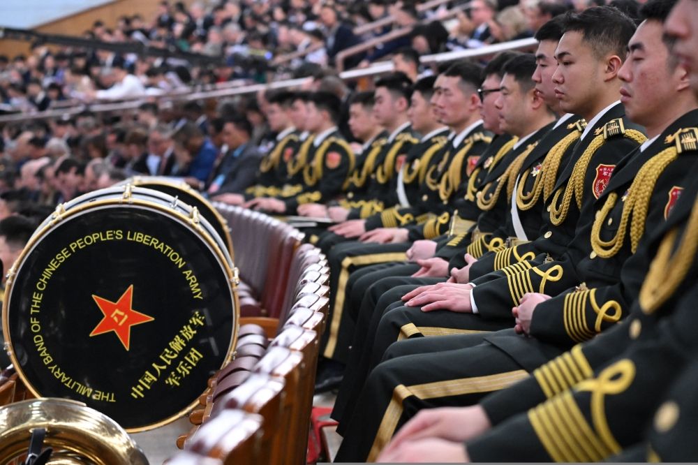 The People’s Liberation Army band members attend the opening session of the National People’s Congress at the Great Hall of the People in Beijing on March 5, 2025. — AFP pic The People’s Liberation Army band members attend the opening session of the National People’s Congress at the Great Hall of the People in Beijing on March 5, 2025. — AFP pic