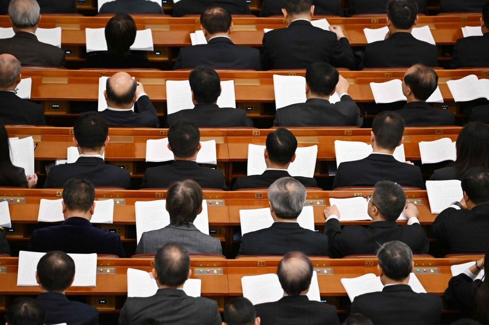 Delegates attend a plenary session of the Chinese People’s Political Consultative Conference at the Great Hall of the People in Beijing on March 9, 2024. — AFP pic Delegates attend a plenary session of the Chinese People’s Political Consultative Conference at the Great Hall of the People in Beijing on March 9, 2024. — AFP pic