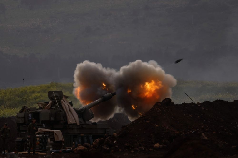 An Israeli artillery unit deployed at a position in the upper Galilee in northern Israel near the Lebanon border, fires towards southern Lebanon on March 14, 2026. — AFP pic An Israeli artillery unit deployed at a position in the upper Galilee in northern Israel near the Lebanon border, fires towards southern Lebanon on March 14, 2026. — AFP pic