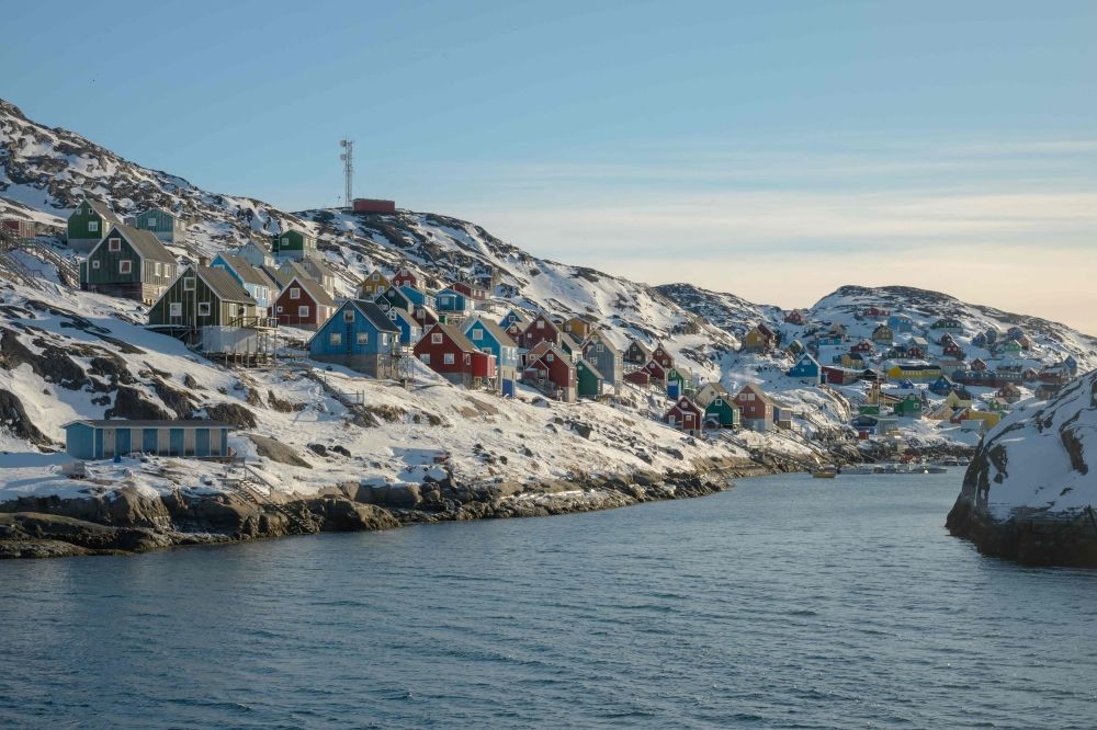 This photograph taken from the deck of the ferry Sarfaq Ittuk, shows, in the morning light, the village of Kangaamiut, Greenland, on March 14, 2026. — AFP pic This photograph taken from the deck of the ferry Sarfaq Ittuk, shows, in the morning light, the village of Kangaamiut, Greenland, on March 14, 2026. — AFP pic