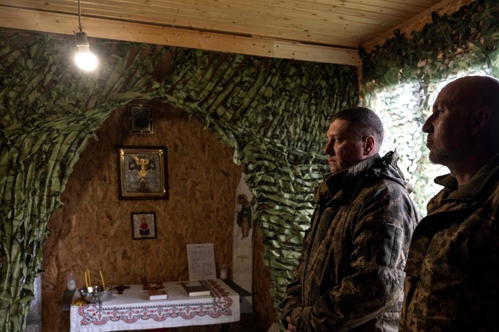 In this handout photograph taken on April 10, 2026 and released on April 11, 2026 by the press service of the 93rd Kholodnyi Yar Separate Mechanized Brigade of the Ukrainian Ground Forces, Ukrainian servicemen attend a religious service in a room turned into a church at an undisclosed location near Sloviansk, Donetsk region, amid the Russian invasion of Ukraine. — Iryna Rybakova/The 93rd Kholodnyi Yar Separate Mechanised Brigade handout/AFP pic In this handout photograph taken on April 10, 2026 and released on April 11, 2026 by the press service of the 93rd Kholodnyi Yar Separate Mechanized Brigade of the Ukrainian Ground Forces, Ukrainian servicemen attend a religious service in a room turned into a church at an undisclosed location near Sloviansk, Donetsk region, amid the Russian invasion of Ukraine. — Iryna Rybakova/The 93rd Kholodnyi Yar Separate Mechanised Brigade handout/AFP pic