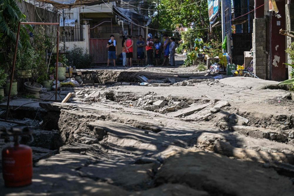 This photo shows a damaged road after a 7.8 magnitude earthquake in General Santos City on June 9, 2026. — AFP pic This photo shows a damaged road after a 7.8 magnitude earthquake in General Santos City on June 9, 2026. — AFP pic
