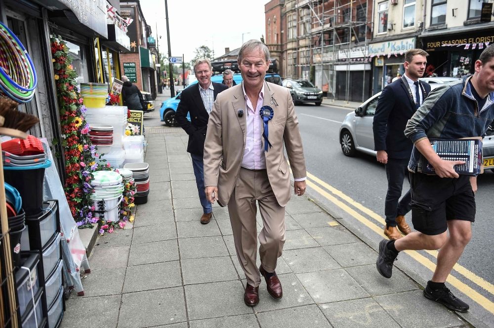 Restore Britain leader Rupert Lowe walks the streets to campaign for the party’s candidate ahead of the Makerfield by-election on June 18, west of Manchester, north-west England on June 13, 2026. — AFP pic Restore Britain leader Rupert Lowe walks the streets to campaign for the party’s candidate ahead of the Makerfield by-election on June 18, west of Manchester, north-west England on June 13, 2026. — AFP pic