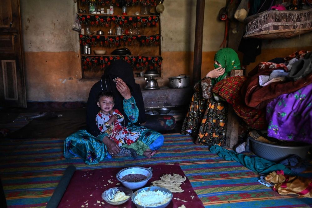 This photograph taken on June 8, 2026 shows Afghan woman farmer Habiba (left) sitting with her daughter Zuheida (right) and granddaughter Saeeda during breakfast at their residence in the Eshtiwi village of Afghanistan’s Parun district. — AFP pic This photograph taken on June 8, 2026 shows Afghan woman farmer Habiba (left) sitting with her daughter Zuheida (right) and granddaughter Saeeda during breakfast at their residence in the Eshtiwi village of Afghanistan’s Parun district. — AFP pic