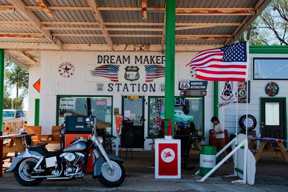 A US flag blows in the wind outside the Dream Maker Station Route 66 Souvenir & Gift Shop at the Route 66 midpoint on June 7, 2026 in Adrian, Texas. Whatever its means, the ‘American dream’ still offers hope to millions of people who believe the United States is a place where anyone can succeed, no matter the odds. — Heather Diehl/Getty Images North America pic via AFP A US flag blows in the wind outside the Dream Maker Station Route 66 Souvenir & Gift Shop at the Route 66 midpoint on June 7, 2026 in Adrian, Texas. Whatever its means, the ‘American dream’ still offers hope to millions of people who believe the United States is a place where anyone can succeed, no matter the odds. — Heather Diehl/Getty Images North America pic via AFP