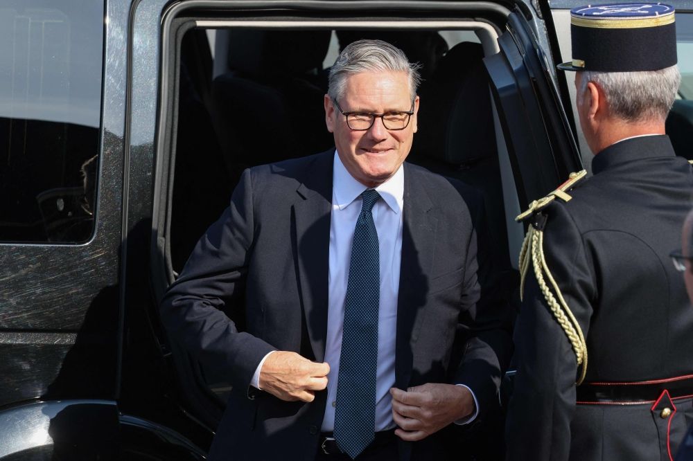 British Prime Minister Keir Starmer arrives for the annual Bastille Day military parade on the Champs-Élysées in Paris on July 14, 2026. British Prime Minister Keir Starmer arrives for the annual Bastille Day military parade on the Champs-Élysées in Paris on July 14, 2026.