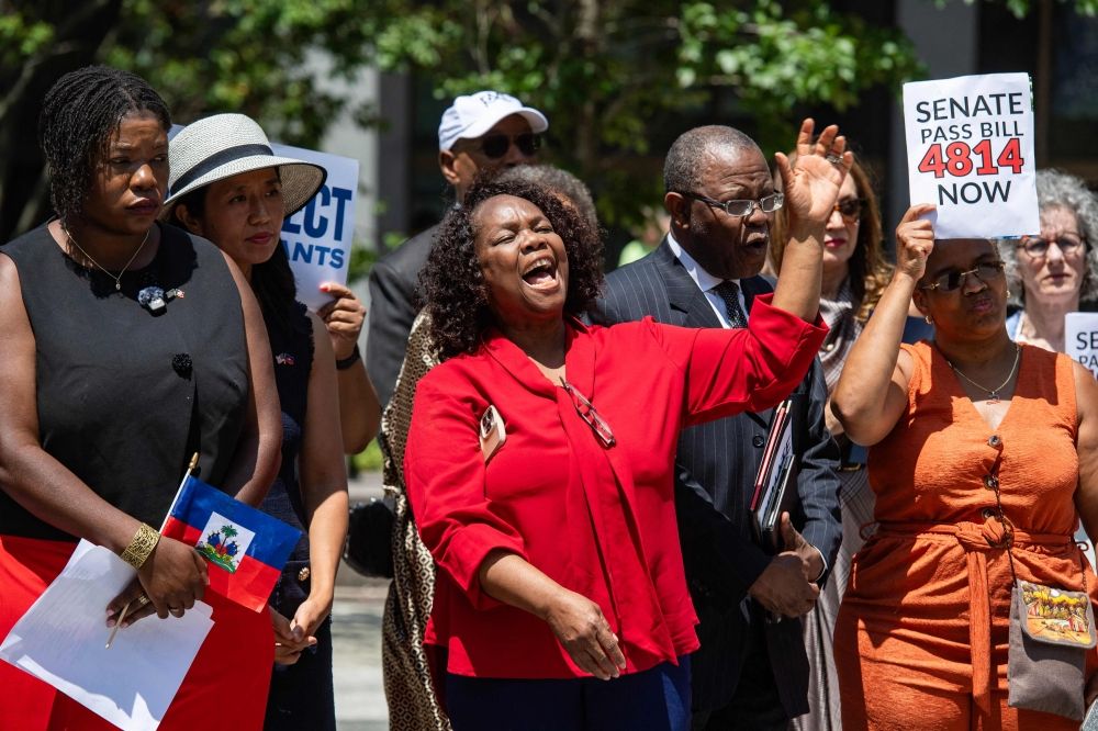 Local Haitian leaders attend a rally calling on Congress to restore Temporary Protected Status (TPS) for Haitians, in Boston, Massachusetts July 23, 2026. — AFP pic Local Haitian leaders attend a rally calling on Congress to restore Temporary Protected Status (TPS) for Haitians, in Boston, Massachusetts July 23, 2026. — AFP pic