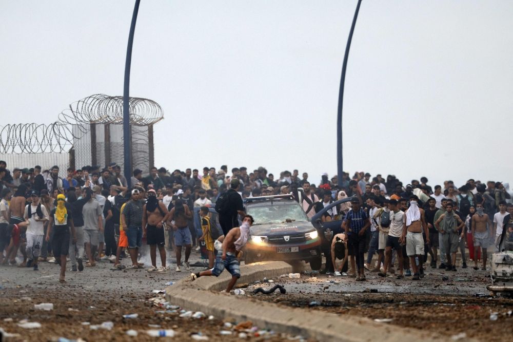 How 60,000 migrants walked into Spain in three days — and why Morocco didn’t stop them People gather at the site of clashes near Fnideq on the Morocco-Spain border on July 31, 2026. — AFP pic