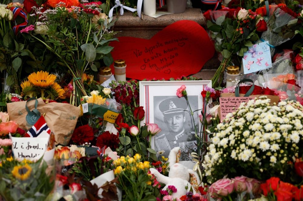 A photograph of late King Harald V of Norway is seen among flowers at a makeshift memorial at the Royal Palace square in Oslo on August 28, 2026, as thousands gathered to pay their respects to the monarch, who died aged 89 after 35 years on the throne. — AFP pic A photograph of late King Harald V of Norway is seen among flowers at a makeshift memorial at the Royal Palace square in Oslo on August 28, 2026, as thousands gathered to pay their respects to the monarch, who died aged 89 after 35 years on the throne. — AFP pic