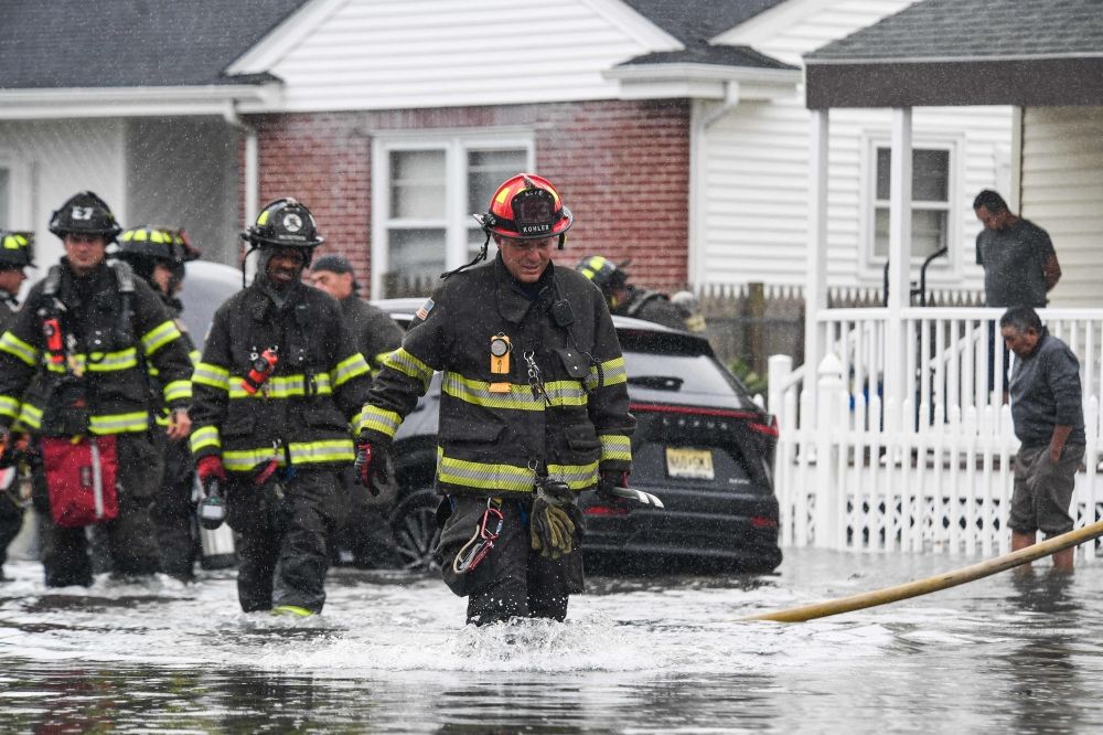 Firefighters of the Atlantic City Fire Department respond to a vehicle fire call in flood waters in Atlantic City, New Jersey, on September 26, 2026. — AFP pic Firefighters of the Atlantic City Fire Department respond to a vehicle fire call in flood waters in Atlantic City, New Jersey, on September 26, 2026. — AFP pic