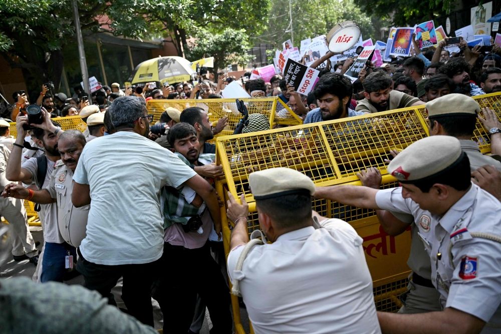 Indian police detain dozens of protesters demanding election chief resign over voter-roll irregularities Protesters and All India Students’ Association (AISA) supporters scuffle with police personnel during a demonstration against India’s Chief Election Commissioner Gyanesh Kumar in New Delhi on October 3, 2026, to demand his resignation over alleged irregularities in the Special Intensive Revision (SIR) of electoral rolls. — AFP pic