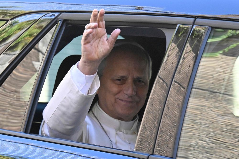 Pope Leo XIV waves from the window of the car as he leaves the Vatican before being admitted to Rome’s Gemelli University Hospital for an operation to remove a lump from his lung, in the Vatican on 13 October 2026. — AFP pic Pope Leo XIV waves from the window of the car as he leaves the Vatican before being admitted to Rome’s Gemelli University Hospital for an operation to remove a lump from his lung, in the Vatican on 13 October 2026. — AFP pic