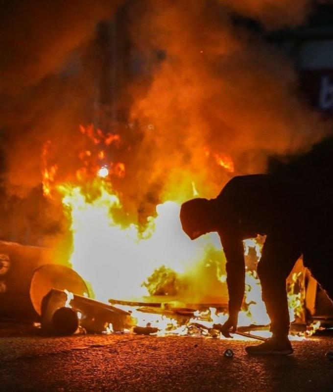 Fourth night of anti-immigrant unrest rocks Northern Ireland, police clash with protestors