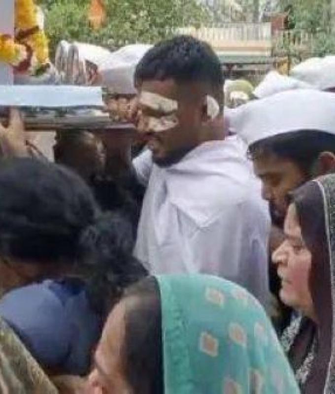 Lone Air India survivor carries coffin of brother killed in crash