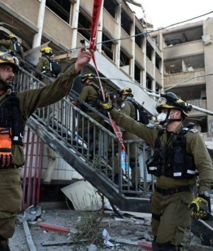Fresh missile barrage hits Israeli port city as high-level talks begin in Geneva
