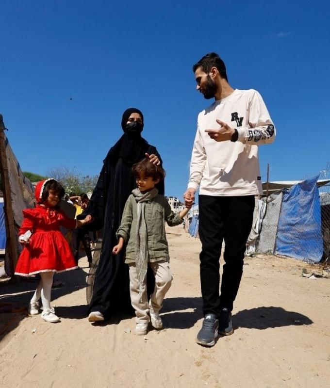 Gaza journalist freed in prisoner swap finds family alive after Israel told him they were dead