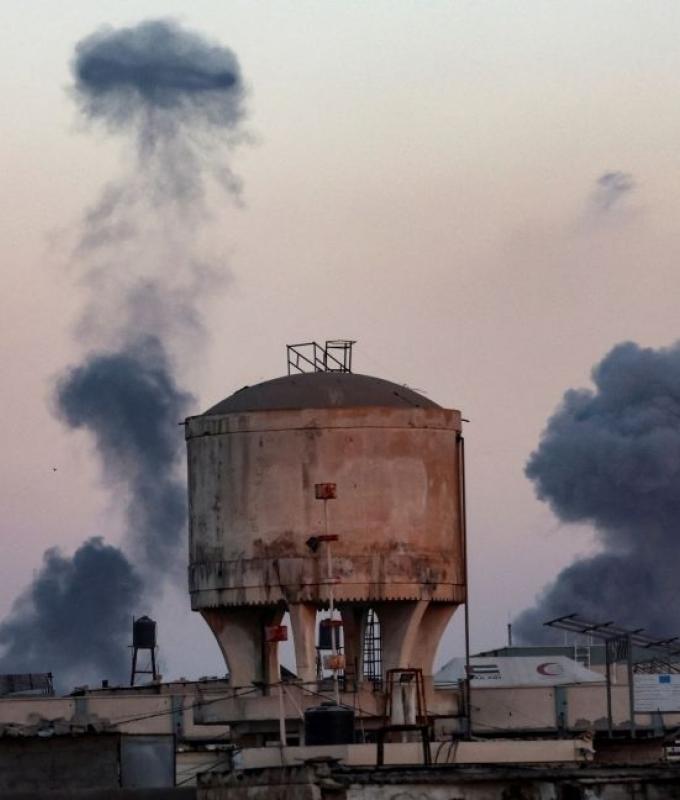 Israel resumes Gaza ceasefire and aid after deadly airstrikes kill 26, dispute over hostages’ bodies continues