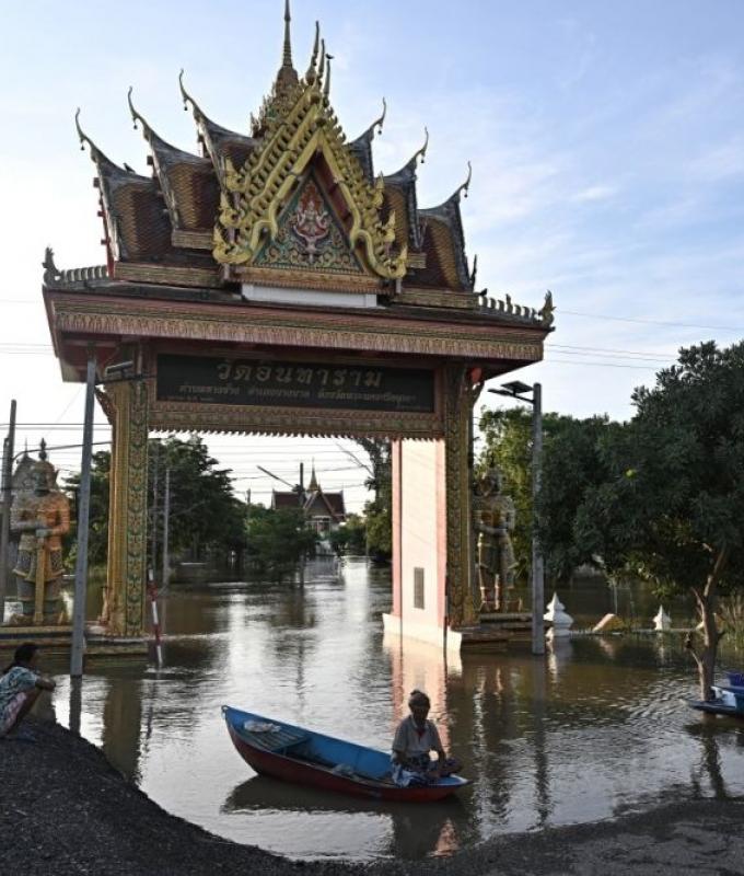 Months of relentless flooding leave Ayutthaya residents navigating dangerous canals