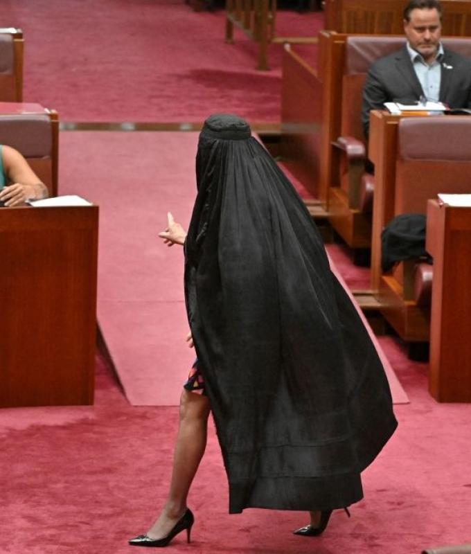 Burqa stunt earns Pauline Hanson seven-day suspension amid fierce condemnation from Australian Senate
