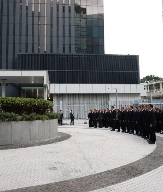 Hong Kong holds moment of silence as nation mourns victims of tower blaze